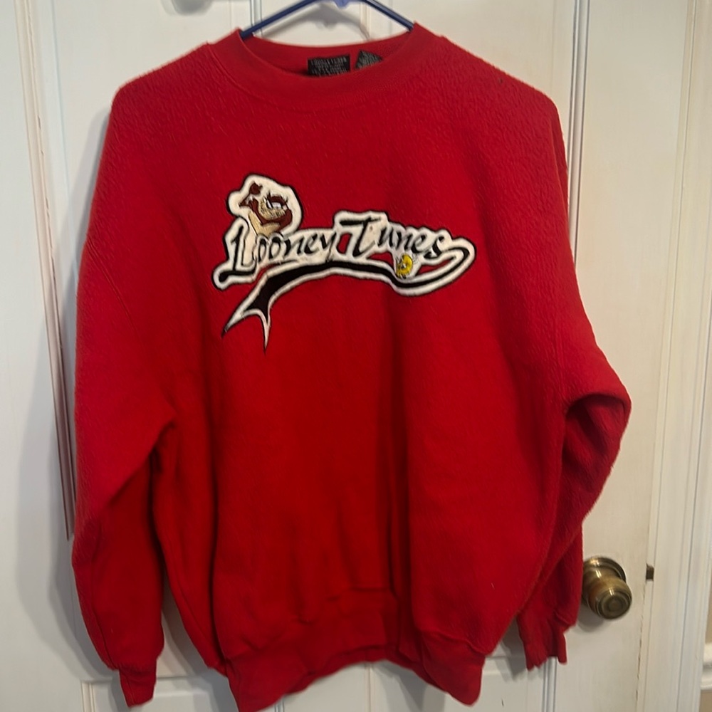 Looney Tunes vintage red fleece crew neck sweatshirt.  Size large